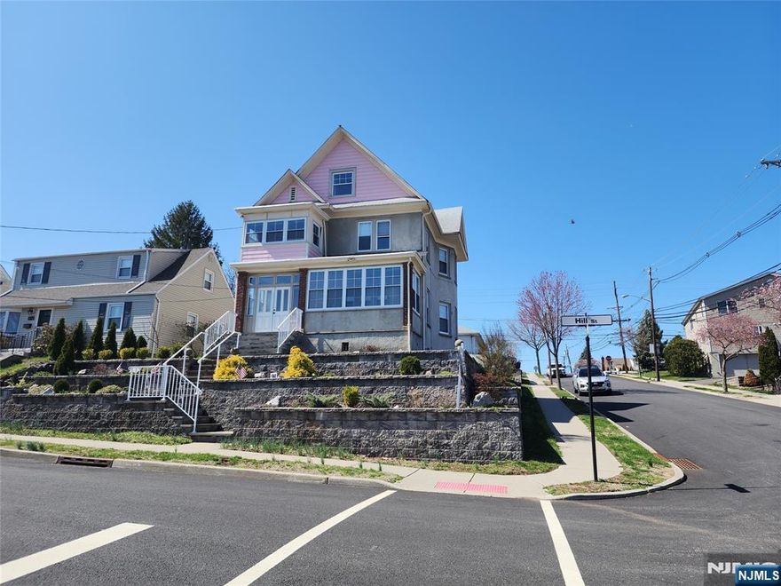 Welcome to this spacious 4 bedroom, 1.5 bath side hall Colonial with a stucco exterior and located on a corner lot in a desirable location. This home presents a wonderful opportunity for those who are not afraid to do some work! In need of updating & some repairs, this property has the potential to become a stunning modern retreat. Enjoy the breathtaking views of the iconic NYC skyline with the convenience of being approx. 30 minutes away & yet just minutes to Met Life Stadium for the sports enthusiasts, the American Dream Mall or even Teterboro airport. This home features an oversized detached garage, a full basement with a wine cellar, laundry and a pantry/storage room, a finished attic with a large bedroom along with the potential to add a full bath. With plenty of storage, wood floors, updated windows, all public utilities & LOW taxes, this great house presents an old-world charm yet offers a lot of potential for the right buyer! Located close to schools, shopping, highways & public transportation, you won't want to miss the opportunity to make this amazing property your own & create the HOME of your dreams!