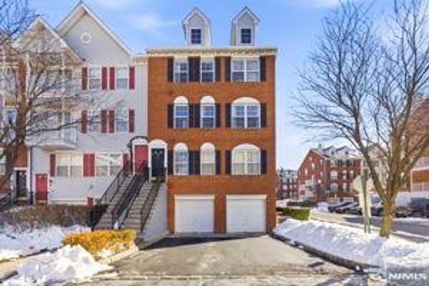 Welcome to 226 Matthews Dr, a beautiful townhouse in the Society Hill section of Newark NJ, just minutes away from Rutgers University. This home offers 3 spacious bedrooms and 2.5 bathrooms, features a sun-filled living room, a generous dinette, and a modern kitchen with stainless steel appliances, granite countertops and a huge pantry. A private balcony is located just off of the kitchen. Hardwood floors run throughout, and the primary bedroom includes an en-suite bathroom. Additional highlights include in-unit laundry, a two car tandem garage, and community amenities such as a pool and tennis courts. Conveniently located near to NYC transportation, major highways, whole foods, parks and much more.