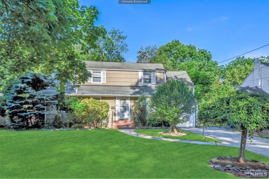 Exceptionally located and 3 bedroom, 2.5 bath colonial backing up to Country Club Golf Couse. Updated kitchen and baths including a master bath. Open 1st floor plane includes kitchen, dining room, living room and den. Finished basement, large 1 car garage, Central AC, 75x125 lot, Close to Schools, and NYC Transportation.