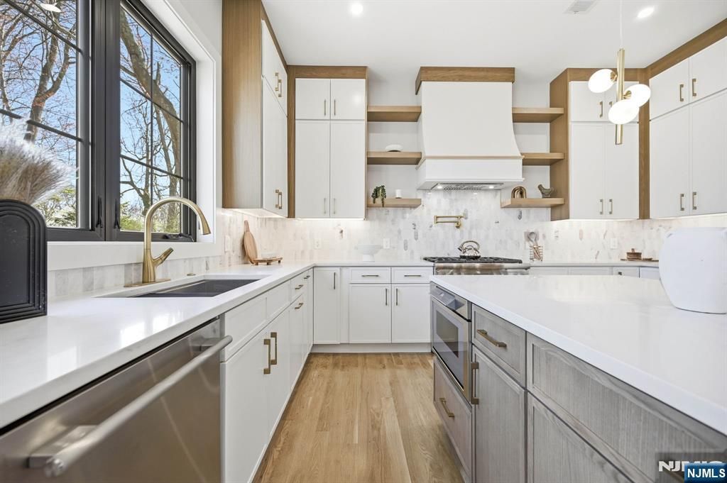 Photo of 74 Irving Avenue, Livingston, NJ 07039 (MLS # 26011654)