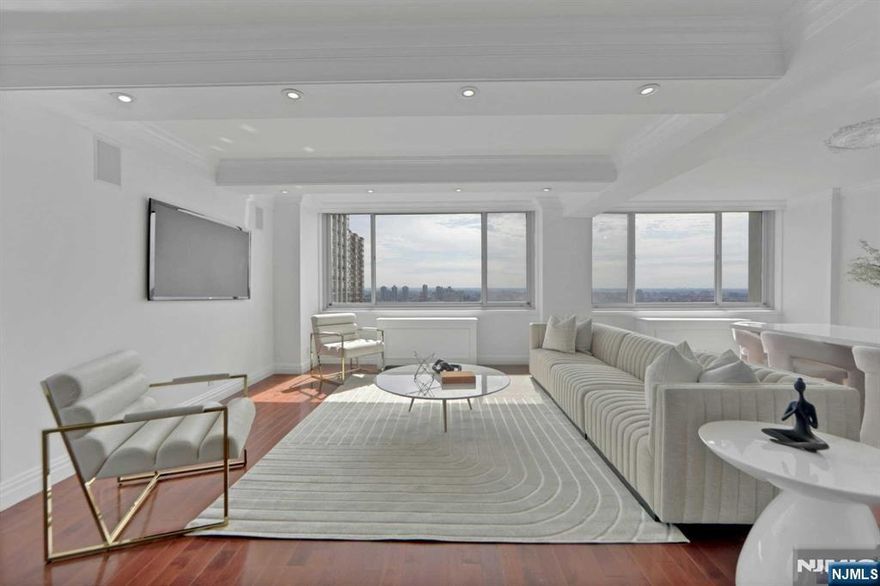 Rarely available 21 and 20-C line combined to offer a gorgeous duplex with 3140 sq. ft (approx) of living space. Panoramic sweeping views span the Hudson River and NYC skyline. Luxurious floor plan has incredible natural light, plenty of entertaining space, 5 bedrooms, 3.5 bathrooms and bonus rooms for den/home offices. There is a full laundry room and lots of closets. Century Tower is a luxury coop with amenities that include 24 hr doorman and concierge, heated outdoor pool, fitness center, BBQ grills, attended garage, kid's playroom and much more. Convenient location near restaurants, Houses of Worship, shopping, great schools and easy transportation to NYC. Parking $90. Subject to Board approval. Don't miss this truly unique opportunity!