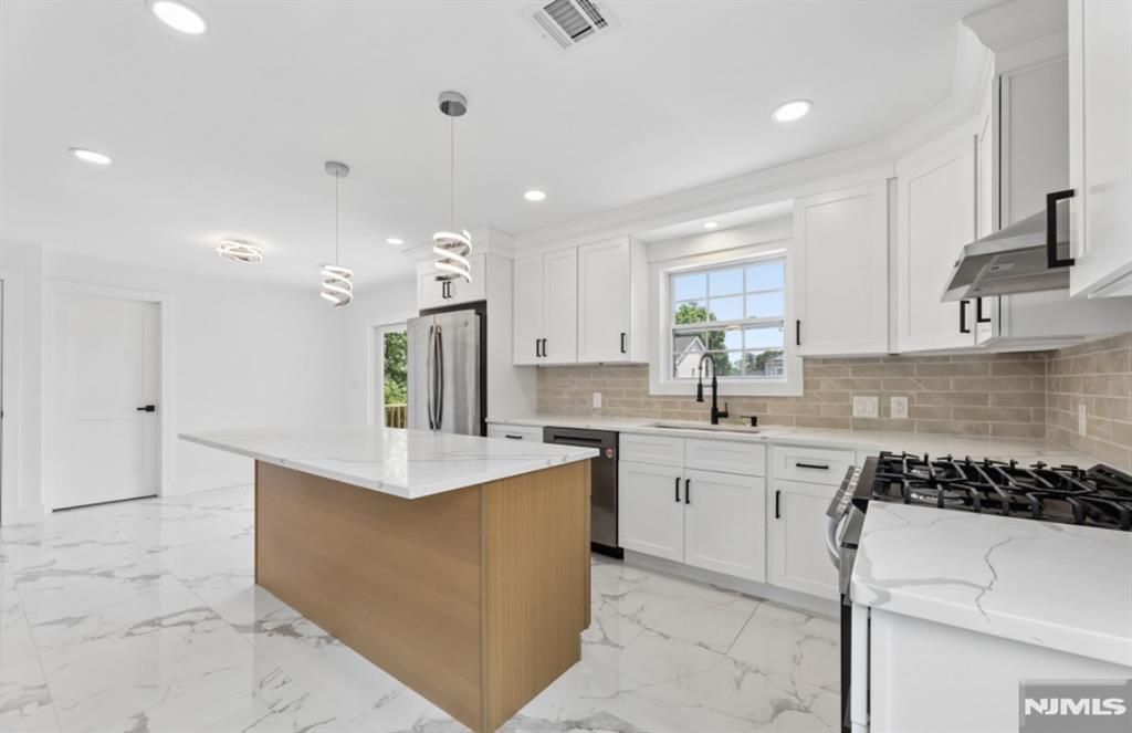 Photo of 8 Annette Terrace, Lodi, NJ 07544 (MLS # 26021695)