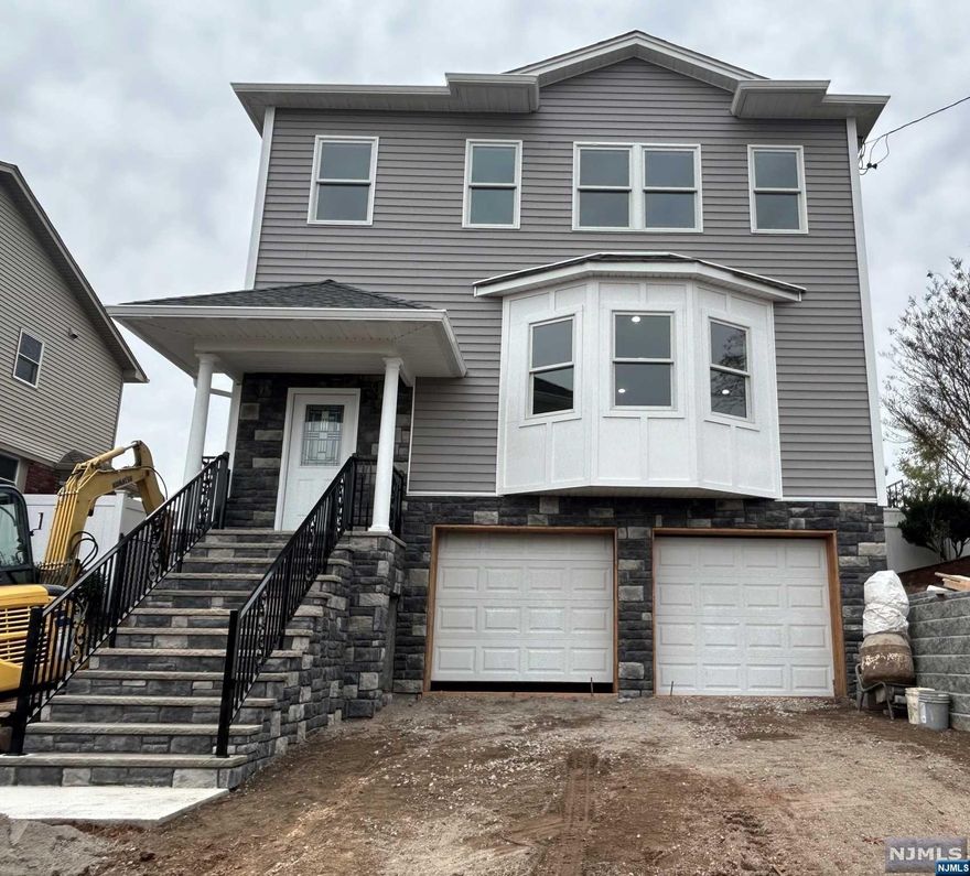 Meticulous new construction & high-end finishes make this home shine! Turnkey and ready for your furniture within weeks. A layout of sun-filled rooms to enjoy for years to come. Entertain in the living room, relax in the family room and play games in the recreation room. An impressive primary bedroom suite offering great space. A bright & sunny dream kitchen with attention to design & comfort. Features include 9 ft. ceiling height on both floors, two-zone HVAC, upscale lighting, specialty tiles, two-car garage and much more. A convenient location close to all your needs. Still time to pick out flooring, appliances & paint.