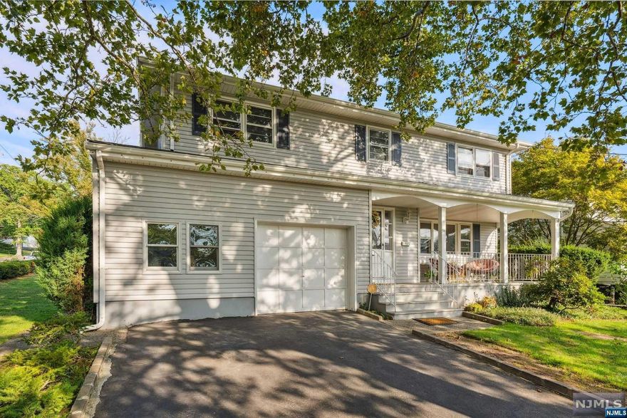 Hurry over to this beautifully maintained spacious Colonial home located in the Maple Valley section of Clifton, where coming home will feel like a sweet escape. This home welcomes you in through the foyer. The 4 bedrooms are all located on the 2nd floor. The primary bedroom has a walk-in & closet and an ensuite full bath and an another full bath in the hallway. The 1st floor features the living room, formal dining room, eat-in kitchen, full bath, connected garage entrance, media/storage room, and family room that leads out to the patio. The basement is finished and has a summer kitchen and half bath. Located just minutes away from gorgeous pockets of nature such as Garret Mountain Reservation, Brookdale Park, Upper Montclair Village, and close to various commuting options with access to route 3, 46, and the GSP. This home offers tranquility, privacy, easy accessibility to shopping, dining, entertainment, and NYC transportation.