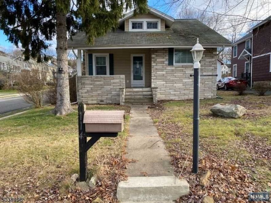 Craftsman Cape home offers all of the original charm of yesteryear. Large kitchen, formal dining & living room with fireplace. 2 additional bedrooms on the second floor as well as an open flexible space for possible office or play area.Full basement, Wood deck extends into the large flat yard with lots of room for recreation. Detached 2 Car garage, updated gas heat, hot water heater, electrical service, roof, and siding. Close to public transportation and all major routes of travel.