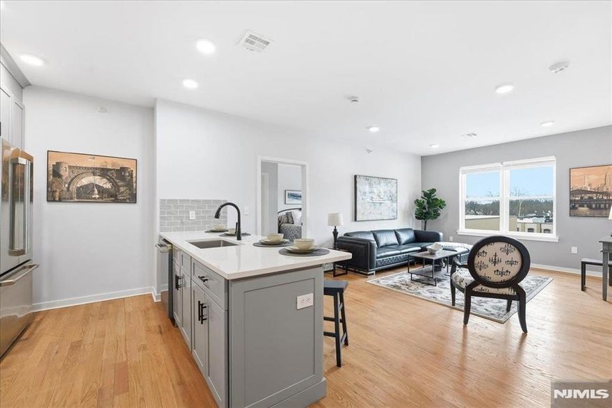 **SPECIAL OFFER - PARKING INCLUDED** Discover Liberty Place - Bloomfield's newest boutique condo community. Now selling our penthouse level. Each residence features solid oak floors, 9ft ceilings, quartz countertops, GE appliances, in-unit washer/dryer, tankless hot water heater, nest thermostat, and primary bath with dual sinks. One deeded parking space available for purchase and can be included in the mortgage. Building amenities include a rooftop deck, wellness gym with NordicTrack equipment, and bike storage. HOA covers water, landscaping and snow removal, garbage and recycling, master insurance, common area maintenance, and building reserves. Located in Bloomfield at the border of Montclair and Glen Ridge, you are in the center of it all! Amazing central location, close to restaurants, shopping, parks and entertainment and just a quick 35 minute train ride to NYC. 5-year tax abatement. 10-year New Construction Warranty. Pets allowed.