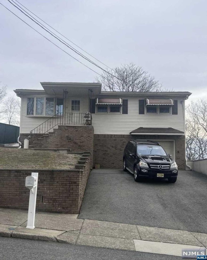investors or downsizing. 3 bedrooms, kitchen, and bath all on one floor! HARDWOOD FLOORS THROUGHOUT. The backyard has gorgeous views of mother nature and offers privacy. Located on upper part of Boyle Ave . Come live in one of the best towns in Passaic county for Schools and low taxes. Great school system, low taxes, walking distance to parks, Shopping (close to Willowbrook Mall)and houses of worship. NO FLOOD. Willing to sell furnished. Sold As-is. HIGHEST AND BEST TO 6/20 AT 5PM