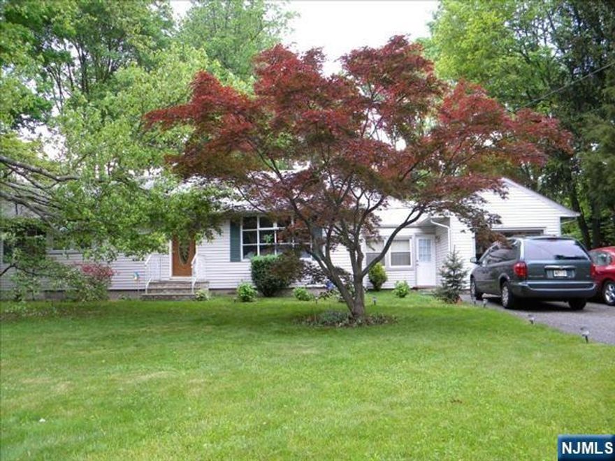 Four Bedroom 2.5 baths with a great layout all very good size rooms, Living room, Dining room Modern eat in kitchen with granite countertops.family room, powder room, master bedroom master bath three additional bedrooms additional modern bath. large private fenced backyard with a large deck, Central air, above ground oil tank Garage a must see.