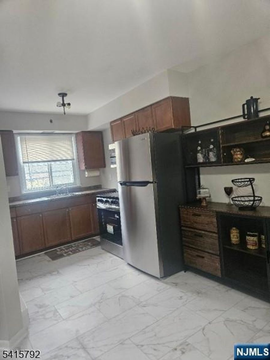Private parking. In unity laundry room w new washer. All new kitchen appliances. Spacious 2-bedroom, 1 full bath second-floor apartment featuring a primary bedroom with double closet. Eat-in kitchen with new appliances, pantry, and new flooring, open to the living room. Additional features include hardwood floors throughout, in-unit laundry, and freshly painted interior. Enjoy views of the water and Dowling Park. Unit includes 2 parking spaces and a 1-car garage on the premises . Conveniently located near major highways, shopping, schools, and public transportation to NYC. No pets. Non-smokers