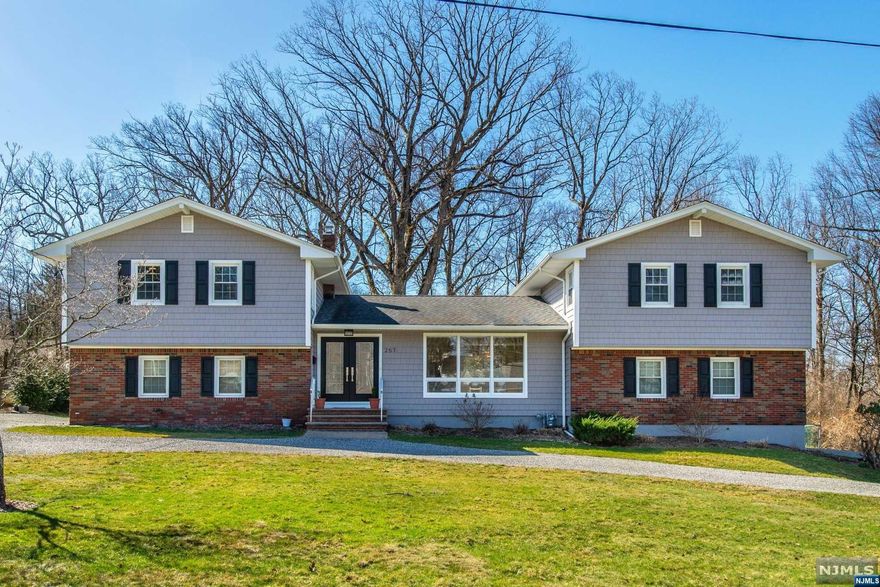 Beautifully updated multigenerational living at its best! This open floor plan boasts full 3 bedroom 2 full bath home with attached 1 bedroom apt & bonus room in between-perfect for remote work/office, leisure room or rec room/playroom.Newer chip & seal driveway & built in transfer switch for generator,port generator negotiable.Meticulously maintained & in pristine condition-light,bright & airy throughout.A half acre of gorgeous property surrounds this gem,nestled high up on a desirable street for ultimate privacy.Perfect for entertaining or your own quiet relaxation.Outstanding Cedar Grove schools & easy access to NYC & transportation, as well as all that downtown Cedar Grove & Montclair have to offer.One of the best neighborhoods in Cedar Grove-don't miss this special property!