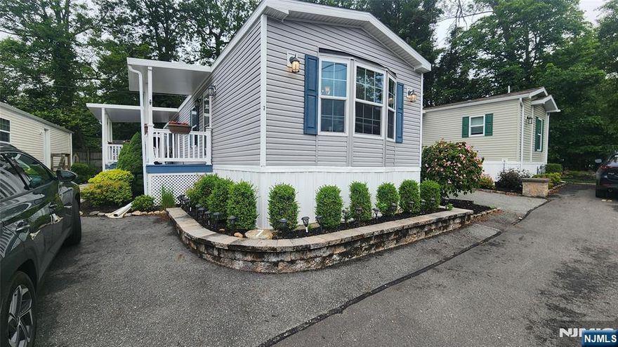 Don't miss your opportunity to own in this sought after 55+ development in the heart of Oak Ridge. This unit features a Covered deck and Porch, stall shower, in unit washer and dryer and comes furnished!! Tucked in the corner of the development offering more privacy then most units. The property has only been used a few month per year, leaving it if almost new condition. Freshly landscaped and ready for you to call home.