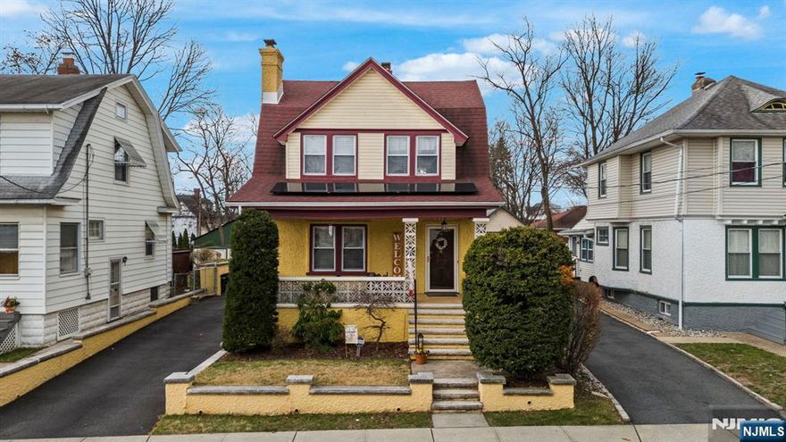 Charming & well maintained home in the heart of West Orange! This delightful home welcomes you with a charming front porch, perfect for relaxing and enjoying sunny mornings with your coffee. Step inside to a bright and inviting living room featuring a cozy wood-burning fireplace, seamlessly flowing into the formal dining area ideal for hosting gatherings. The kitchen boasts stainless steel appliances, solid wood cabinets, and direct access to the backyard, ready for your personal touch. Upstairs, youâ€™ll find a spacious primary bedroom, two additional bedrooms, and a full bath.The finished basement expands your living space with a second kitchen, a generous family room, and a convenient laundry area a fantastic setup for a potential mother/daughter arrangement.Outside, the spacious yard includes a detached garage, perfect for storage or a workshop, along with a patio area thatâ€™s great for grilling, lounging, and enjoying the outdoors. Conveniently located near all major public transportation, this home offers easy access to everything West Orange has to offer!
