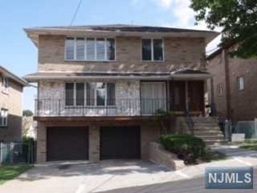 Well maintained 2-family house in immaculate condition. Great buying opportunity for live-in owners or investors. This spacious property with southern exposure features: Plenty of rooms with sunlights, Airtight windows are installed in all bedrooms, New bathrooms and newer windows, Hardwood Floor underneath the carpet, Tiled floors are used in the entrance hall, the kitchen, the bathrooms, and the ground floor. The above ground floor has a huge finished tiled ground floor with lots of potential. Newly built partial retaining wall in the back border. All other retaining walls are fixed. New concrete cement driveway, walkways. Underground drain pipes are all replaced. Each floor has a separate front entrance. Kitchen counters, granite 1F, slide stones 2F, are installed. The 1F kitchen has own side entrance.The 2F laundry room is next to the kitchen. 2-car garage parking. The current lease of the 2F continues until December 31st 2022. The 1F is currently vacant.