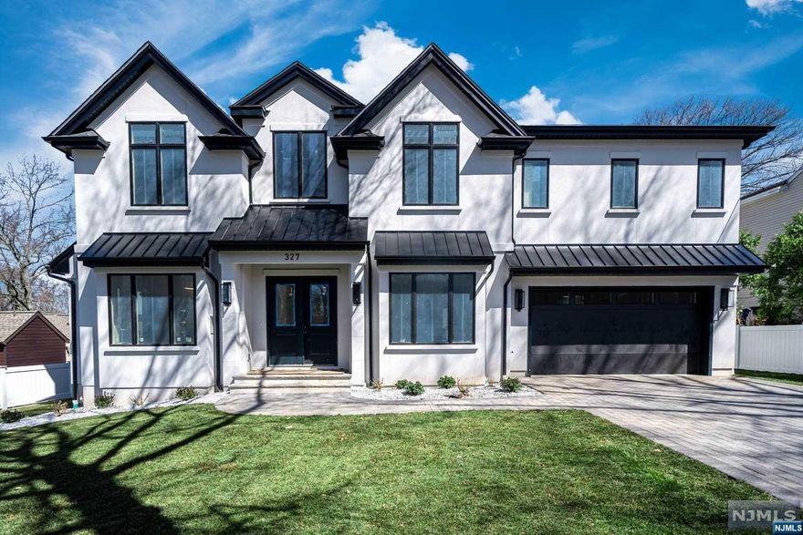 EXTREMELY IMPRESSIVE Brand New Construction in the heart of Paramus. Sitting on a RARE, 85x144 Oversized Lot. To feature 7,000 sq ft of living space (on all 3 levels). 6 bedrooms & 6.5 baths. Dramatic 2 Story Foyer. Amazing flow & design. Custom woodwork throughout. CHEF-INSPIRED KITCHEN w. custom built St. Martin cabinetry, SUB-ZERO& WOLF Appliances. Waterfall Island & Butler's Pantry. Spectacular Family Room. Bedroom & Full Bath on 1st level plus 1/2 bath, LR, DR. 2nd level features Dream Primary Suite. HUGE Double Closets w. custom shelving. Spa-Like Primary Bathroom w. soaking tub, double toilet closets, double vanities, glass shower. 3 additional bedrooms on this level, each hosting W.I.C.'s & en-suite bathrooms. AMENITIES GALORE in the finished basement w. GYM, MOVIE THEATER, WET-BAR, Bedroom & Bathroom, & HUGE REC ROOM. 2 car garage & mudroom. Paver walkways, backyard patio, & driveway. Fully Fenced Property. Pictures are from Same Builder, Similar Build & Finishes!