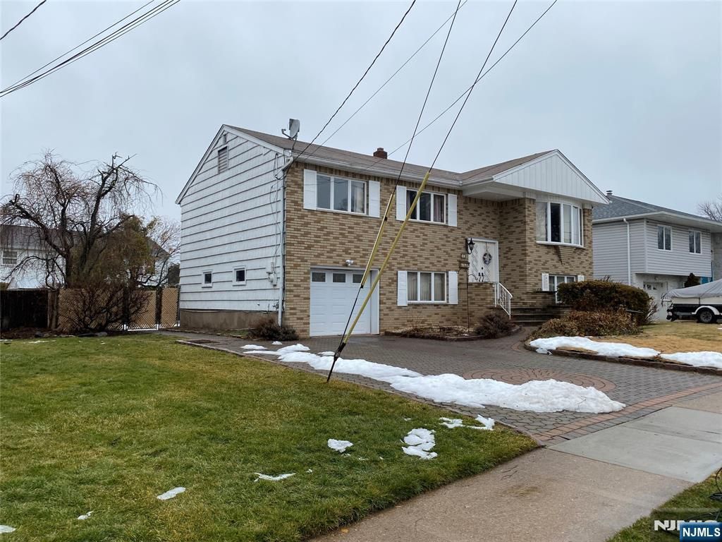 Photo of 95 Atkins Terrace, East Rutherford, NJ 07073 (MLS # 26005999)