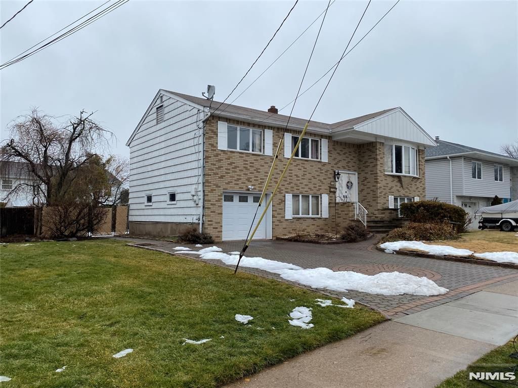 Photo of 95 Atkins Terrace, East Rutherford, NJ 07073 (MLS # 26005999)