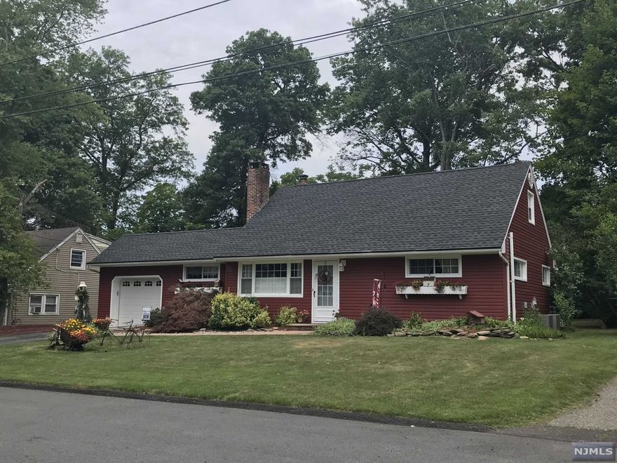 Move right into this charming cape cod home... Main floor features cozy gas fireplace and open floor plan with dining and family room. 4 Bedroom, two bath, laundry/play room with full dormer and huge back yard to expand to your heart's desire.This one's a must see and won't last in desirable Wayne township. Convenient to local shopping and transportation. Newer roof, Anderson windows, Norman Rockwell siding, appliances, crown molding and MORE!