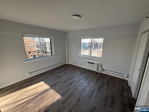 Photo of 47 Polifly Rd #A1, Hackensack, NJ 07601 (MLS # 26014533)