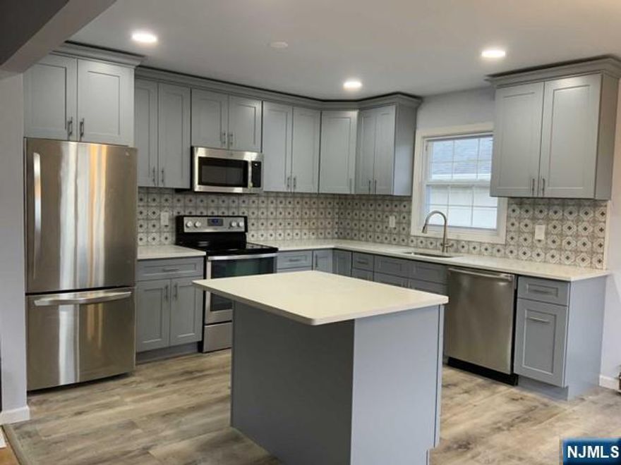 Charming and Beautifully Renovated 3 Bedrooms and 2 Bathrooms 2nd Floor unit. Newly Kitchen and Bathrooms. Newly appliances. Newly Windows and doors. New central A/C(2021).All 3 Bedrooms are generous in size with attached Master Bathroom. Fresh Painted(2021). Hardwood floors Throughout. Washer and dryer in unit. Bright and Sunny house. Shared use of back yard. Parking for 2 cars in driveway. Close to NYC transportation, All major highways, Restaurants, Shopping and Schools. Quiet street and Prime location of Palisades Park. Landlord takes care of landscaping. Tenant takes care of snow removal. NO Pets. Ready to move in!!!!