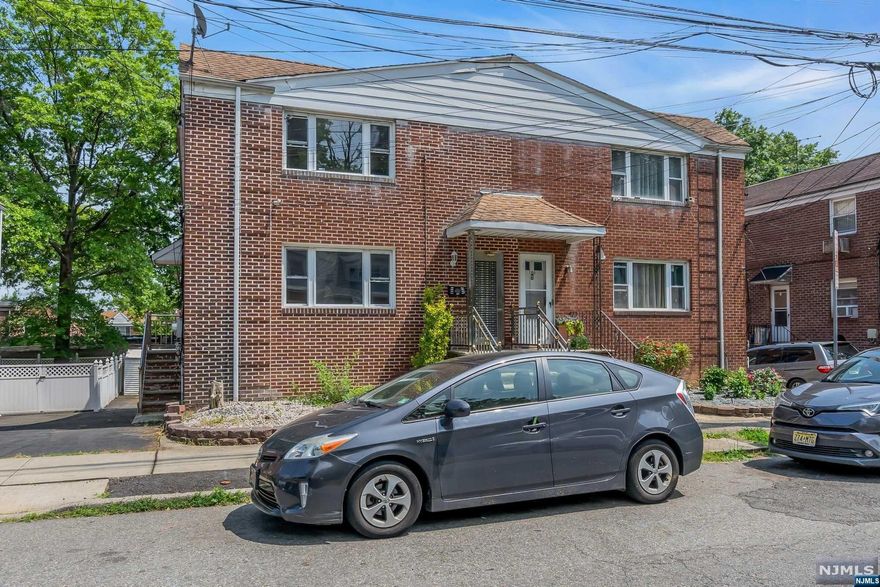 Beautifully renovated brick "Fully Vacant" 2-family home in the Upper Vailsburg section, steps away from Maplewood. Both apartments in this newly renovated home feature beautiful upgraded kitchens with granite countertops and stainless-steel appliances, including dishwashers and built-in microwaves. Each unit has a very spacious dining room and a large, sunny living room. Unit 1 includes a large, fully finished basement with additional living space, a full bathroom, and a laundry area with a washer and dryer. It also has interior access to two garages, with one garage being heated. Enjoy two garage spaces, with one convertible to an extra room. The home has central heating and cooling. There is a large backyard plus a raised patio perfect for entertaining and a shed for storage. Don't miss this perfect blend of comfort and convenience!