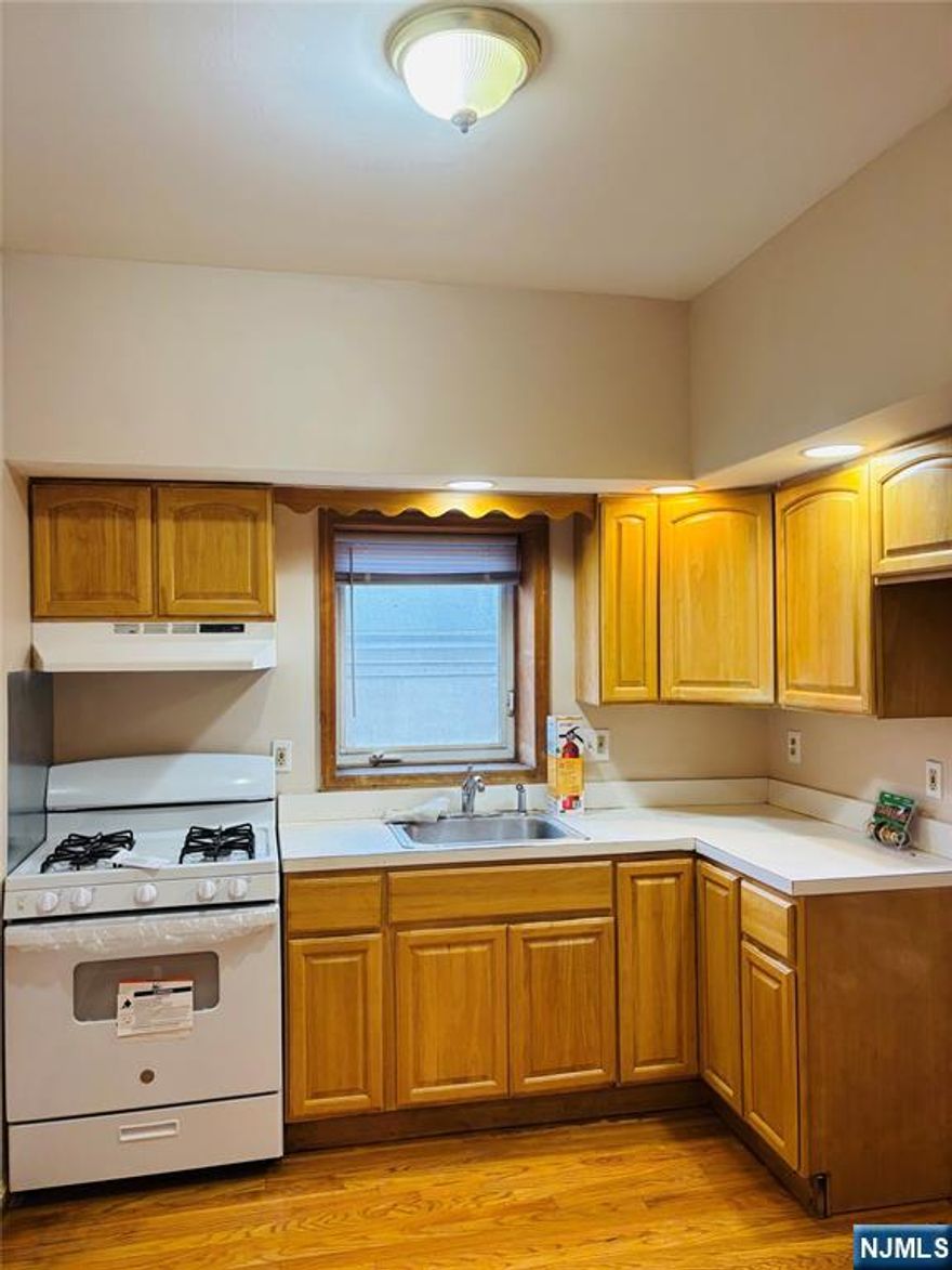 OPEN HOUSE SATURDAY AUGUST 30TH FROM 12-2PM. Welcome to this freshly cleaned, second-floor apartment featuring three comfortable bedrooms and beautiful hardwood floors throughout. Enjoy the convenience of a reserved parking spot right outside your door, with plenty of easy street parking available for guests or additional vehicles. Small pets are welcome, making it a great choice for pet lovers! Situated directly across from Ridge Laundromat at 148 Ridge Rd, laundry day couldnâ€™t be easier. The location also offers close proximity to schools, places of worship, restaurants, and shoppingâ€”everything you need is within reach. Public transportation is just steps away, with bus stops across the street providing seamless connections to surrounding areas. Donâ€™t miss the opportunity to make this well-located, comfortable apartment your new home. Floor plan attached.