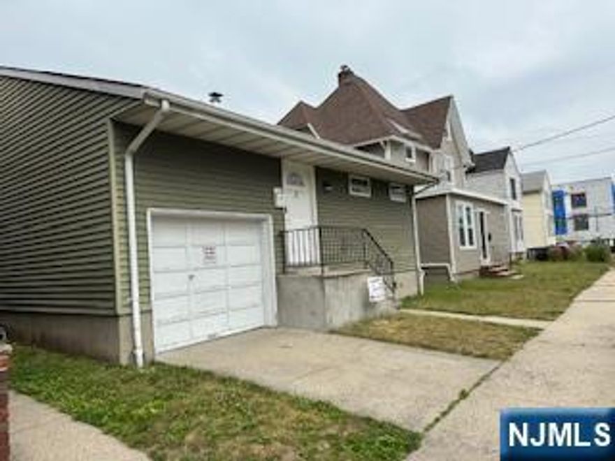 All the Amenities you need in your Own Private Home! This house features LR, DR, 2 spacious BR, Updated Kitchen with sleek quartz countertops, Stainless Steel Appliances, Central Air, Hardwood Floors, Nice size back yard, Family Room, and Laundry Room in the finished basement.