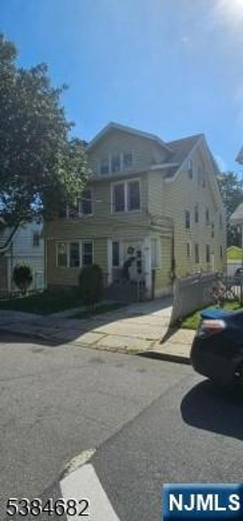 Photo of 236 Lincoln Place, Irvington, NJ 07111 (MLS # 25034505)