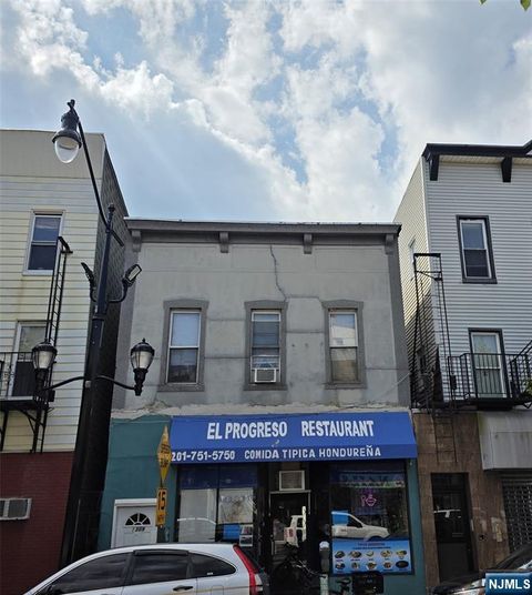 Photo of 1309 Summit Avenue, Union City, NJ 07087 (MLS # 26026309)