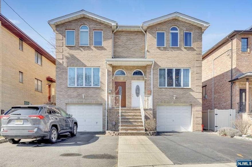 All Brick 1/2 Duplex in residential section of Cliffside Park bordering Fort Lee. Hardwood Floors throughout. 1st Floor features Entrance Foyer, Living Room, Laundry Room, Formal Dining Room, Large Eat-In-Kitchen leading to Sliding Door to Deck. 2nd Floor features Master Bedroom with Master Bath, 2 Bedroom and Full Bath. Ground Floor features one car Garage, Separate Entrance, Full Bath, Family Room. Central A/C and Central VAC. Conveniently located close to NYC, all major Transportation, Shopping and Restaurants.