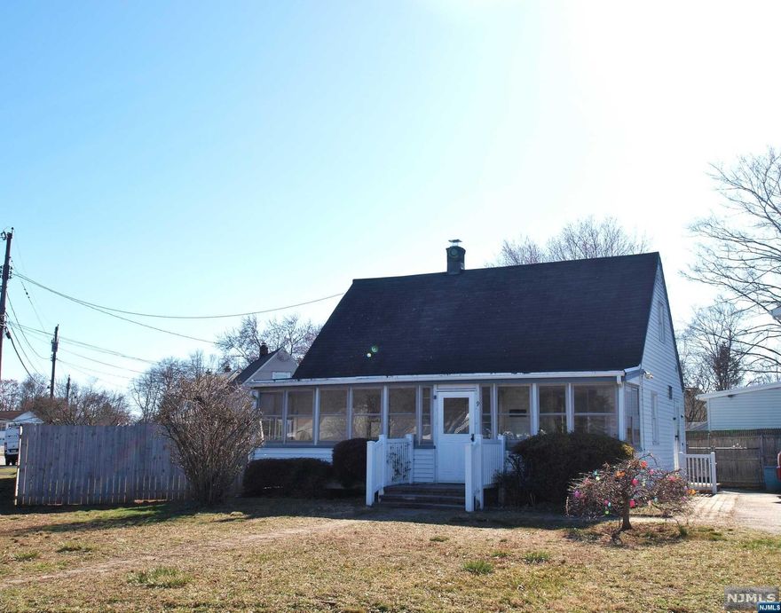Charming Cape that sits on a wonderful corner lot and Cul de Sac. Located minutes off I-287 and Bergen Cty Rt. 208 for easy commute. Ready to go Cape that's larger than it looks from the street. Enclosed front porch is perfect for some extra space. Living Room with wood floors and an open breakfast bar to the Kitchen. Newer tiled floor in the Kitchen and plenty of cabinets. Side door has access to the rear yard. Primary Bedroom with good closet space, 2nd Bedroom and full bath complete this floor. 2nd level offers 2 very good size bedrooms, again with good closet space. Many homes in the are do not offer a basement, this home has one!! Laundry, Storage and you can easily finish off a area if needed. Bilco doors up to the rear yard. You'll love the fenced in level yard and Stone patio. Storage shed and nice area to play in. Close to Back Beach, schools and restaurants.