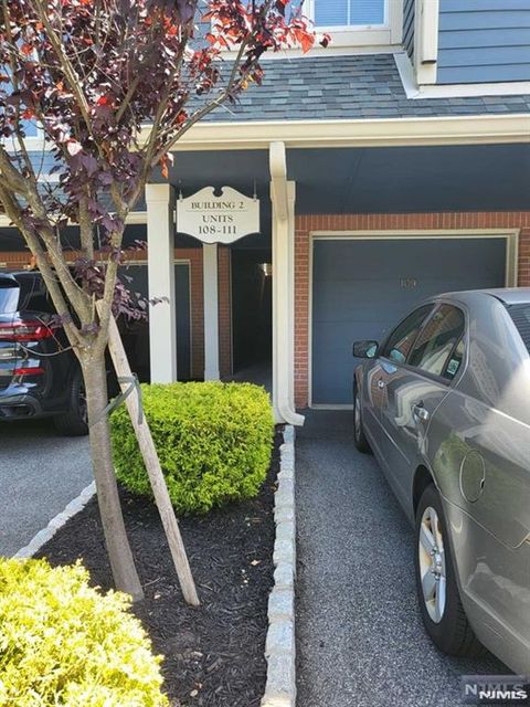 Photo of 108 Surrey Ct #108, Ramsey, NJ 07446 (MLS # 25041950)