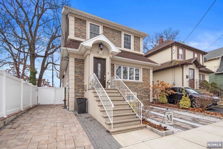 Complete Renovation, Updated and Expanded in Ridgefield's most convenient location! Open Layout, Custom Island Kitchen , Living Room with electric fireplace, New Roof Less than a year, 2 zone AC. Amazing backyard Complete with Paver Patio, Outdoor Kitchen & maintenance free turf! Spacious Master Bedroom with separate Bath, finished basement has full bathroom. 2 off street parking spaces. Pack your bags and move right in!