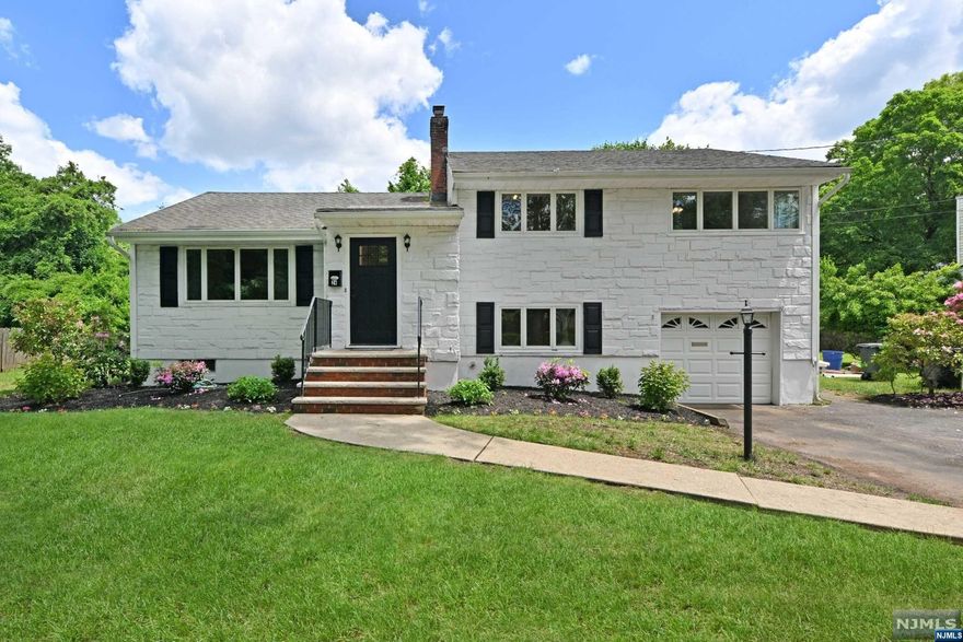 Becoming one of the most desirable neighborhoods in Ho-Ho-Kus. Welcome to 24 Spruce Place- Quiet, low trafficked street, walk to school, bus, train, town. Formal living room w/fireplace is so nice in the winter. Formal dining room right off kitchen with French doors into family rm. Showcasing the "must see" open concept family room with cathedral ceiling and large windows directly off of the kitchen. Sliding glass doors lead to the large deck. Great for inside and outside entertaining. The sleeping area has three nice sized bedrooms, a full hallway bath and one half bath in the primary suite. The lower level den/office, provides additional private living area with a full bath (could become a 4th BR). Bonus space in basement of the addition-for game room/gym and workshop! Ho-Ho-Kus was ranked the #1 suburb to live in NJ out of 418 towns, the #1 place to live in Bergen County, out of 70 towns, and the 47th best place to live in America by market leader- "Niche"- for 2023