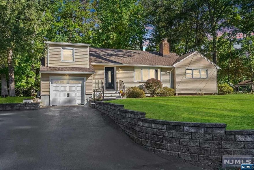 Welcome to this charming 3-bedroom, 2-bathroom ranch on a corner lot in the highly sought-after Pines Lake! Step inside to discover abundant natural light and a flowing floor plan. This move-in-ready home features a spacious living room, formal dining room, and 2 main-level bedrooms with beautiful hardwood flooring. The updated bathrooms add modern comfort, while the kitchen boasts granite countertops and stainless steel appliances, leading to a lovely 3-season room ideal for entertaining. Upstairs, the main bedroom includes a generous walk-in closet. The partially finished basement offers extra living and storage space, plus access to the attached 1-car garage. Outside, enjoy over a third of an acre of pristine flat land, just a short walk to Pines Lake Elementary School and the lake, where you can swim, boat, and fish!