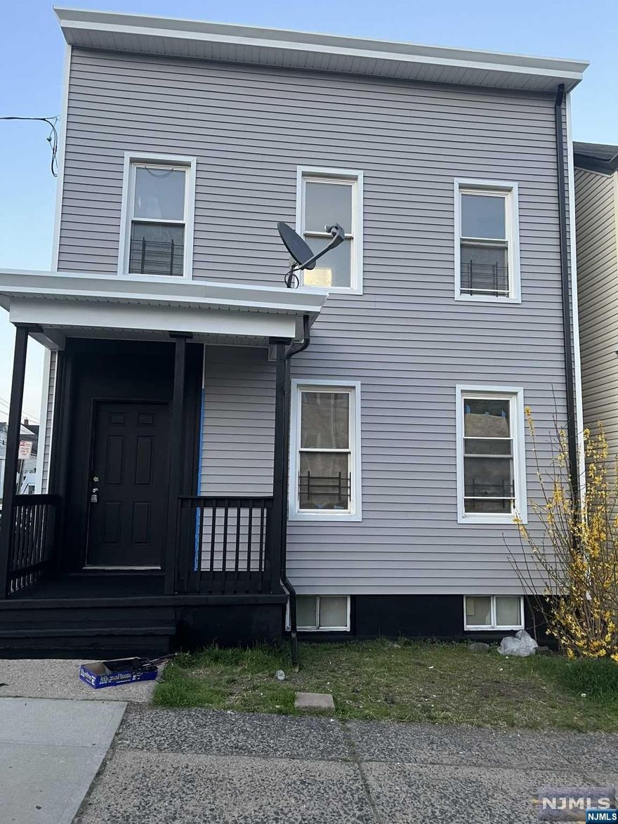 Impeccably renovated 2 Family Home. New siding, new heating, new hot water heaters. Each unit has renovated modern bathrooms and kitchen. First floor connects to basement, and 2nd floor has use of finished attic. Separate utilities for each income producing unit.