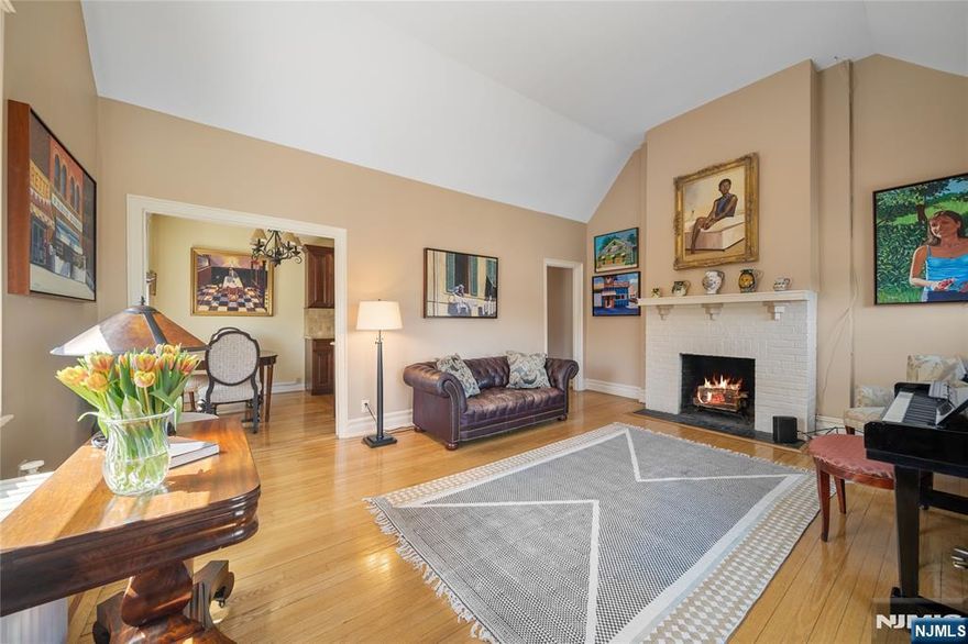 Desirable East Hill! Top-floor 2BR/1BA corner residence in the sought-after Dwight Manor. This rare penthouse-level home features soaring vaulted ceilings in the living room, one of only two units with cathedral ceilings along with a wood-burning fireplace and hardwood floors. The updated kitchen boasts granite countertops, stainless steel appliances, fridge, and gas stove. Radiated heat and window A/C provide year-round comfort. The bathroom includes a classic tub and tilework. Located in Building A of a 95-unit elevator complex (Buildings Aâ€“D). Deeded outdoor parking space (#8) included. Storage available at an additional cost. Lobby-level laundry is card-operated. HOA: $561.22/month + $177.50 special assessment (through 12/31/25). Parking fee: $3/month. Taxes approx. $7,200/year. No pets allowed.