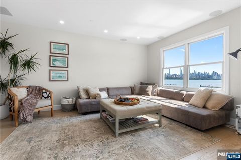 Photo of 121 The Promenade #121-122, Edgewater, NJ 07020 (MLS # 25034882)