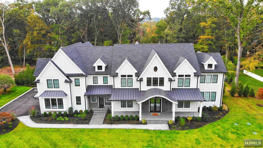 The outstanding quality and exceptional design of this showcase home is guaranteed to surpass all expectations. Set on a very private acre and quiet cul de sac. This six bedroom, six bath custom built colonial exudes luxury thru design and quality construction. An open layout delineates spaces w/intricate ceiling detail and custom fixtures. Grand two story foyer with dramatic stairwell is flanked by an upscale Dining Room. The kitchen is the heart of the home, designed by Kuche+Cucina with custom Doca USA cabinets and large Dekton waterfall island. Kitchen opens to Great Room anchored by oversized fireplace and wall of windows overlooking professionally landscaped yard. Master bedroom is tranquil retreat with fireplace, luxurious spa bathroom and custom closets. Outdoor covered porch with FPL will lure you outside at any night of the year. The attention to details is endless.