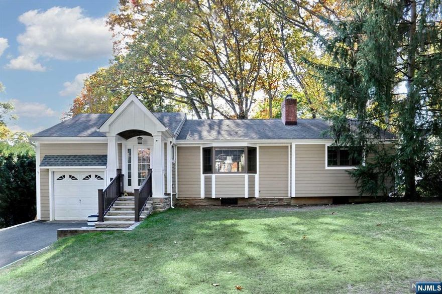 Charming Ranch Home on Serene Cul-de-Sac! Welcome to your warm and inviting ranch-style home, perfectly situated on a peaceful cul-de-sac. This well-maintained property features beautiful hardwood floors, enhancing its cozy atmosphere. The spacious living room is the heart of the home, complete with a charming fireplace, perfect for those chilly evenings. You'll appreciate the thoughtful built-ins that offer both style and functionality. Modern kitchen and bathroom. The basement provides ample storage space and includes a convenient half bathroom. Step outside through sliding glass doors to discover a patio overlooking a large, fenced-in yard, ideal for pets or entertaining guests. Enjoy summer gatherings on the spacious deck enjoying the surrounding greenery. This home seamlessly combines comfort and practicality, making it an ideal for your family and guests. Don't miss your chance to make this lovely home your own!