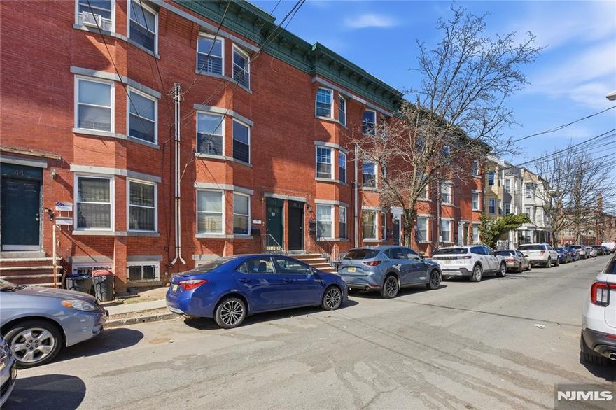 Welcome to this spacious 3-bedroom duplex apartment offering comfort, functionality, and a convenient location in Newark. This thoughtfully designed home features two full bathrooms and a flexible layout ideal for modern living. The first level includes a private primary suite with its own full bathroom, providing comfort and separation from the rest of the home. Upstairs, you'll find two additional generously sized bedrooms and another full bathroom, creating a practical layout for shared living. The duplex offers bright living spaces, ample room for everyday living, and a layout that provides both privacy and convenience. Located in a well-connected Newark neighborhood, the property is close to shopping, dining, and everyday conveniences. Commuters will appreciate easy access to public transportation and major highways, with approximately 10 minutes to Downtown Newark and about 30 minutes to New York City via Newark Penn Station.