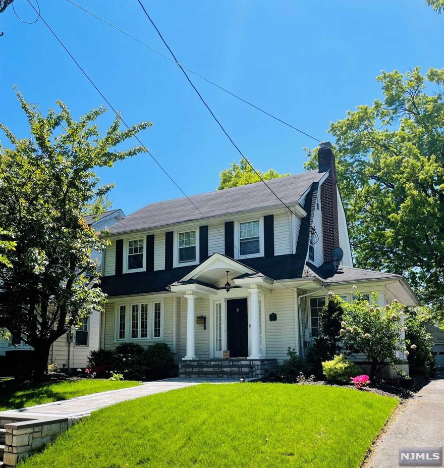Spacious Colonial in one of Ridgefield Park's best locations. Living room with Fireplace with additional sitting room and a light filled sun room currently used as a playroom. Beautiful renovated kitchen with granite countertops and SS Appliances, a spacious dinning area complete the first floor. Second floor consists of 3 nice size bedrooms and a fully renovated tiled bath. Third floor finished attic for extra space. Finished basement with family room with beautiful renovated full bath. Lovely backyard for your summer entertaining. All this on huge 50 x 140 lot and a 2 car garage completes this beautiful home. This home is full of love and the new owners will love it too!