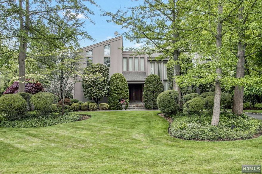 THIS DISTINCTIVE CONTEMPORARY SITUATED ON A BEAUTIFULLY LANDSCAPED ACRE OF PRIVACY AND TRANQUILITY WILL EXCEED YOUR HIGHEST EXPECTATIONS. LOCATED ON THE PRESTIGIOUS EAST HILL OF CRESSKILL, THIS GRACIOUS HOME OFFERS A LARGE ENTRY FOYER AND A WONDERFUL OPEN FLOW FROM ROOM TO ROOM. ELEGANT & TASTEFULLY DESIGNED COMPLETE WITH TODAY'S MODERN AMENITIES AND THE FINEST OF CRAFTSMANSHIP AND DETAILS THROUGHOUT. LARGE FORMAL DINING ROOM, LIVING ROOM/GREAT ROOM W/FIREPLACE, IDEAL FOR ENTERTAINING OVERLOOKING THE LUSH PARK LIKE GROUNDS AND POOL, SPACIOUS GOURMET KITCHEN W/BREAKFAST AREA & LARGE CENTER ISLAND, PRIMARY SUITE WITH HIGH CEILING, TWO OUTFITTED CLOSETS, 3 ADDITIONAL BEDROOMS, FULL BATHROOM, LOWER LEVEL FEATURES A REC AREA W/FIREPLACE, GAME ROOM, GYM, FULL BATH AND STORAGE. JUST A SHORT DISTANCE FROM NEW YORK CITY THIS HOME OFFERS THE PERFECT BLEND FOR COUNTRY LIVING & URBAN SOPHISTICATION.