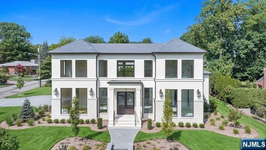 Introducing 15 Loretta Court, an exquisite French Contemporary situated on a spacious corner lot in the North Cliffs. This new construction 5 Bdrm, 5.5 Bath boasts elegance and sophistication in every detail including vaulted 20' ceilings and floor-to-ceiling windows that flood the interior with natural light, Oak wood floors throughout, open-concept gourmet kitchen is a chef's dream, equipped with designer appliances and a chic butler's pantry, light-filled dining room and powder room featuring a one-of-a-kind stone wall that sets the tone for luxury from the moment you enter. Four out of the five bedrooms boast en-suite bathrooms and outfitted closets. Additionally, the first floor offers the flexibility of a library/home office, catering to your specific needs. Basement equipped with a stunning bar, space for either a billiard room or gym, in addition to a full bedroom and full bath. Backyard includes a cover patio with fireplace.