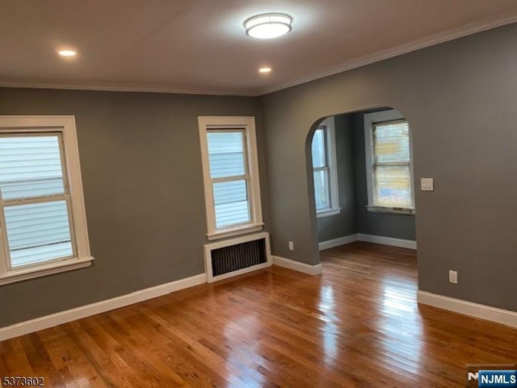 Photo of 54 Rutgers Street, Irvington, NJ 07111 (MLS # 25027177)