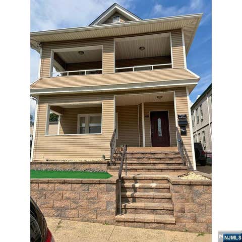 Photo of 46 Palmer ST, Passaic, NJ 07055 (MLS # 26029933)