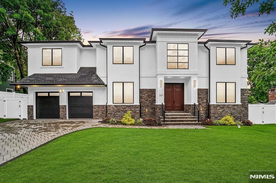 Contemp. colonial Masterpiece w/6 BR's and 5.5 baths,6750 sqft of living space. Stunning stone & stucco exterior over Hardie Board provide both beauty & durability.2-story entry foyer w/10-foot ceilings. This level features a FLR, FDR, and FR w/FPL, Modern eat-in kit w/island and sep. dining, BR w/FB and a well-designed powder room add practicality to this level. The MBR features a luxurious master bath & unbelievable walk-in closet. The 2nd floor also houses a junior suite, 2 additional BR's with a Jack-&-Jill bathroom, each with ample walk-in closet space and custom designed ceilings. A dedicated laundry room adds convenience. The fully finished 2100 sqft BSMT offers radiant heating, a home theater w/surround sound,gym, rec room,BR w/ FB. Features 6 zone heat, lawn sprinkler sys, camera security sys, central vac, in-law suite,warranty, top of the line appliances,wine fridge & coffee bar, walk in closets and pantry, window treatments