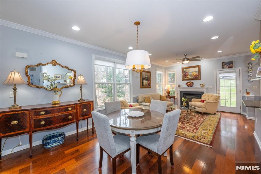 The highly sought-after Drexel unit is a desirable corner residence offering a private, tucked-away setting with the ease of spacious, multi-level living and the rare advantage of main-level, one-floor living. Designed with an open and inviting floor plan, the main level features a generous primary suite complete with a beautifully appointed bath, including a soaking tub, separate stall shower, and walk-in closet. The seamless layout flows from the living room to the dining area and into the upgraded kitchen, creating an ideal setting for both everyday living and entertaining. The kitchen is appointed with granite countertops, custom cabinetry, and stainless-steel appliances, while a gas fireplace adds warmth and character to the main living space. Step outside to a private walk-out terrace, perfect for grilling or enjoying quiet evenings outdoors. Upstairs, youâ€™ll find two large bedrooms with ample closet space and a full bath, offering flexibility for guests, home office space, or additional living needs. A private in-unit elevator provides convenient access to all levels, making daily living effortless and setting this unit apart. The ground level includes a bonus room, additional storage, elevator access, and direct entry to the garage. An exceptional opportunity for those seeking comfort, functionality, and low-maintenance luxury living.