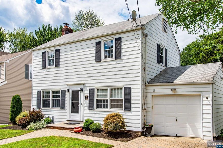 Fantastic center-hall colonial in the Oakview Section of Bloomfield! This home offers so much including hardwood floors, spacious rooms, an eat-in kitchen with a peninsula and breakfast nook, large family room/sunroom in the back, finished basement with a full bathroom, central AC (2016), wood-burning fireplace, paver patio, garage and more!