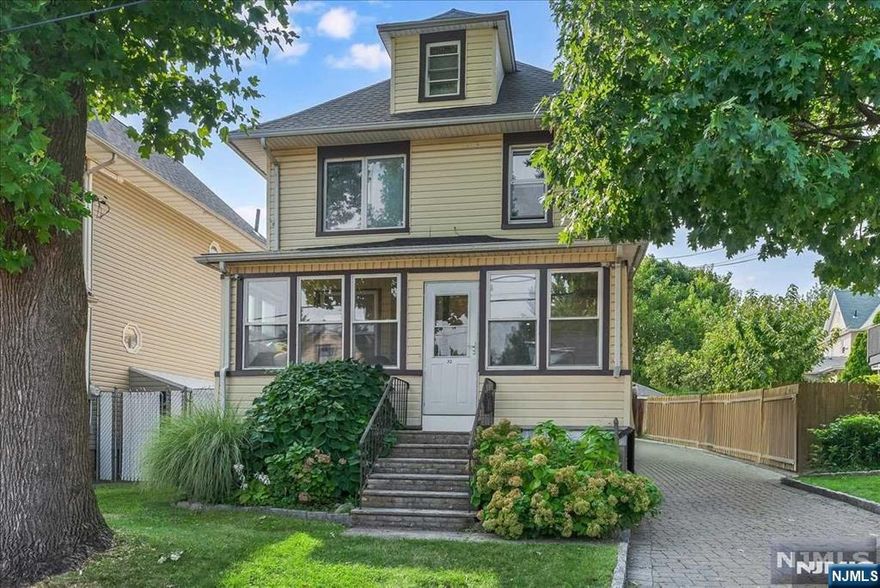 Step into this beautifully renovated home, where modern comfort meets timeless charm. The updated kitchen features top-of-the-line stainless steel appliances, perfect for your culinary adventures. Upstairs, three cozy bedrooms and a luxurious full bath with custom Italian marble provide a serene retreat. Stay comfortable with whisper-quiet ductless AC units and radiant floor heating. The third floor offers a versatile space with a half bath, ready for your personal touch. A finished basement adds extra living space, complete with a new washer/dryer and ample storage. Outside, enjoy a private backyard patio and a 3-car garage with a new floor. With hardwood floors, central vacuum, a security system, and sprinklers, this home is packed with modern amenities. Conveniently located close to transportation, it's ready for you to move in and make it your own.