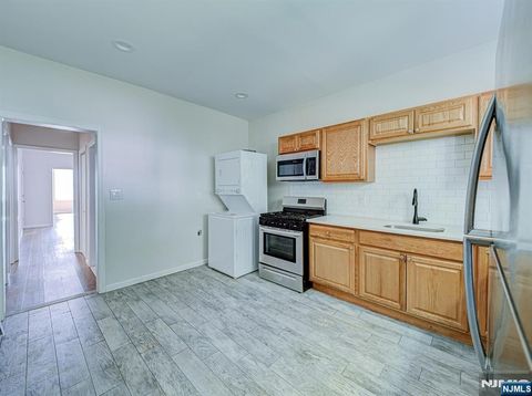 Photo of 193 Clerk St, Jersey City, NJ 07305 (MLS # 26019932)
